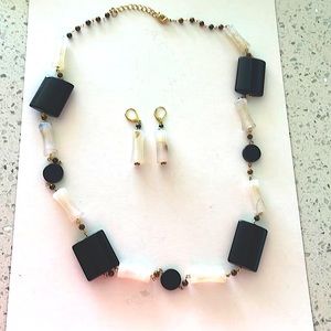 Set of necklace and matching earrings